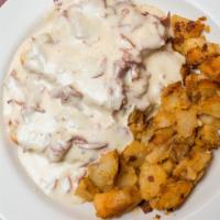 Creamed Chipped Beef With 2 Eggs · Tender beef cooked in a creamy butter gravy, served over toast with home fries.