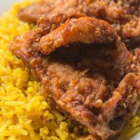 Fried Chicken Thigh And Breast · Delicious 2 piece deep fried chicken meal that comes with your choice of rice and drink.
