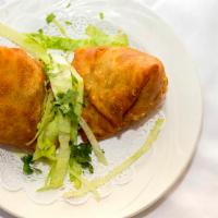 Samosa (2 Pieces) · Most popular. Crispy pastry turnover filled with minced meat or vegetables.