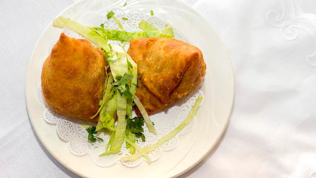 Samosa (2 Pieces) · Most popular. Crispy pastry turnover filled with minced meat or vegetables.