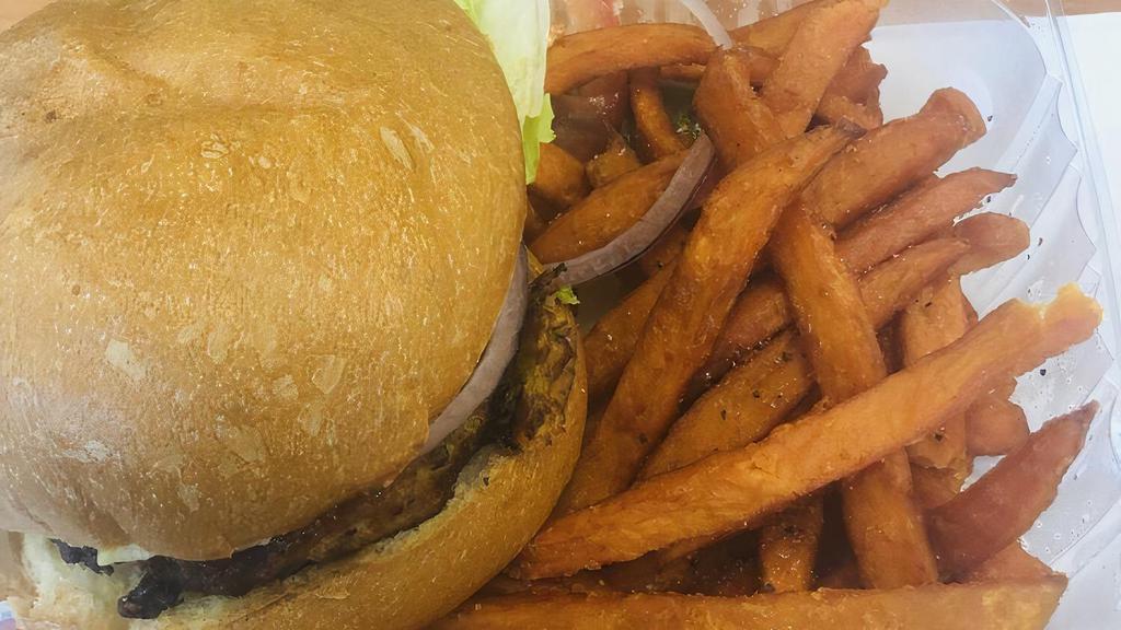Veggie Burger · Half pound burger on a seeded bun.