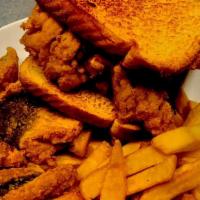 Fish Sandwich · Sandwich made with a piece of cut fish that is fried