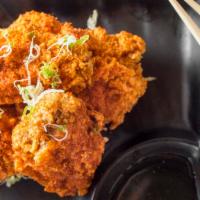Fried Chicken Wings · Honey Wasabi and chili sauce.