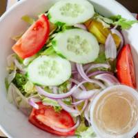 House Salad · Mixed greens, tomato, cucumber, olives, onion and pepperoncini.