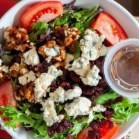 Gorgonzola Salad · Fresh mesclun greens, Gorgonzola cheese, tomatoes, candied walnuts, dried cranberries and ba...