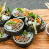 Bulgogi Beef Kimbap · White or brown rice, seaweed, bulgogi beef, carrots, cucumbers, pickled radish, red leaf let...