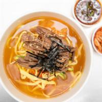 Beef Janchi Noodles · thin Korean somen noodles, janjjorim beef, yubu, carrots, zucchini, seaweed, egg omelette, s...