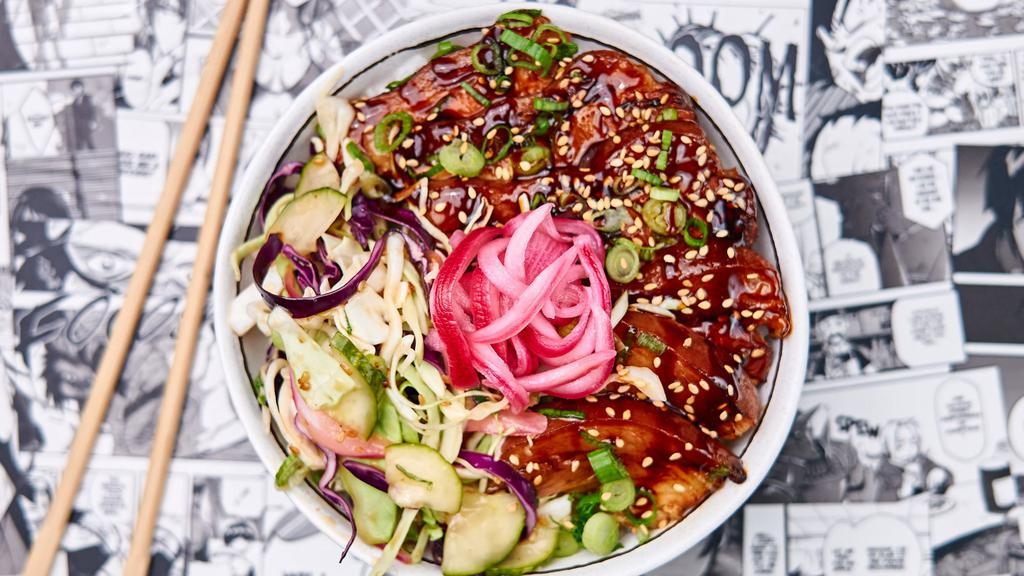 Original Chasu Don · Melt-in-your-mouth braised pork belly glazed with umami shoyu reduction, cabbage slaw, pickled cucumbers, and choice of base
