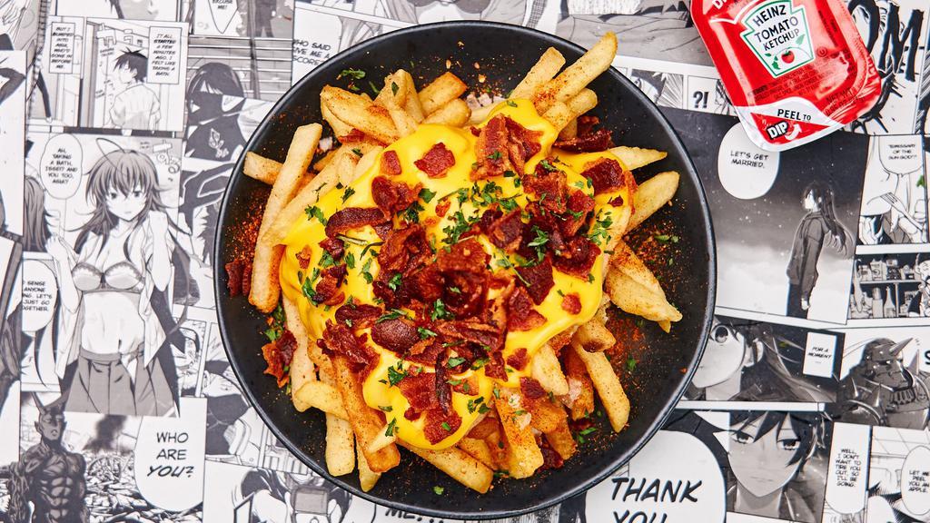Bacon Cheese Fries · Crispy handcut fries with our homemade cheese sauce topped with a crispy bacon crumble.