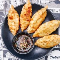 King Yaki Pork Gyoza · 5 pieces of our King size homemade seared then steamed pork dumplings