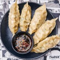 King Steamed Pork Gyoza · 5 pieces of our King size homemade steamed pork dumplings