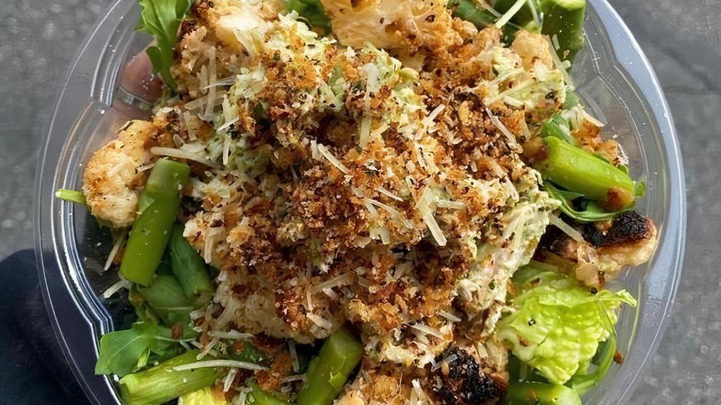 Seasonal! Pesto Roasted Chicken Salad · Arugula, Romaine, Asparagus, Cauliflower, Parmesan, Crispy Breadcrumbs & Pesto Vinaigrette