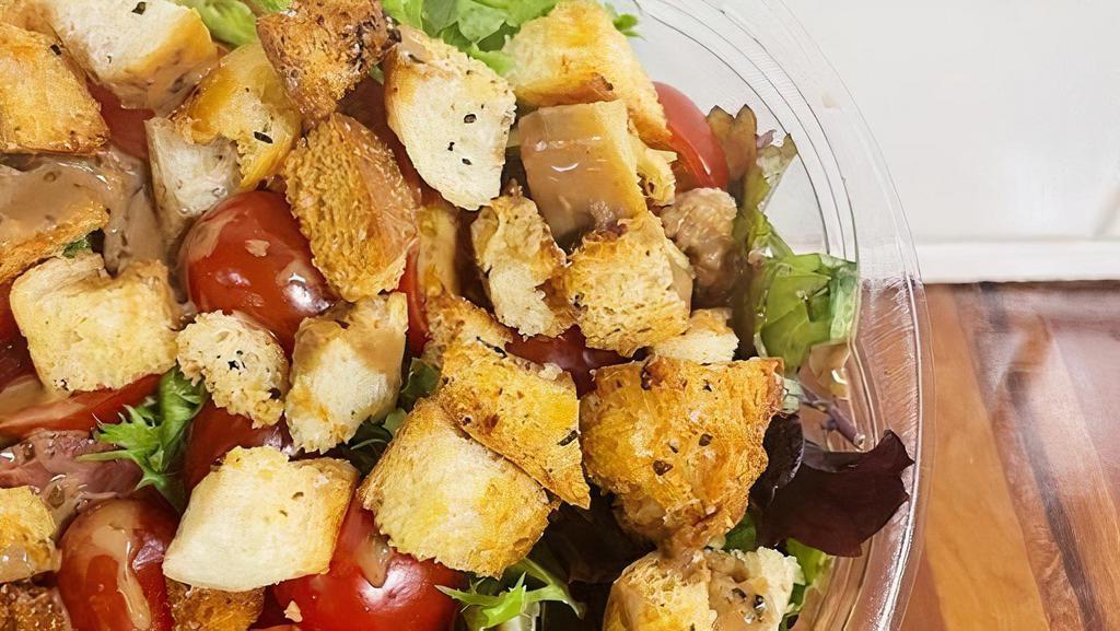 House Salad · Mixed Greens, Cherry Tomatoes, Housemade Croutons & Balsamic