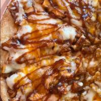 Bbq Pizza Slice · Topped with BBQ sauce, mozzarella and chicken meat.