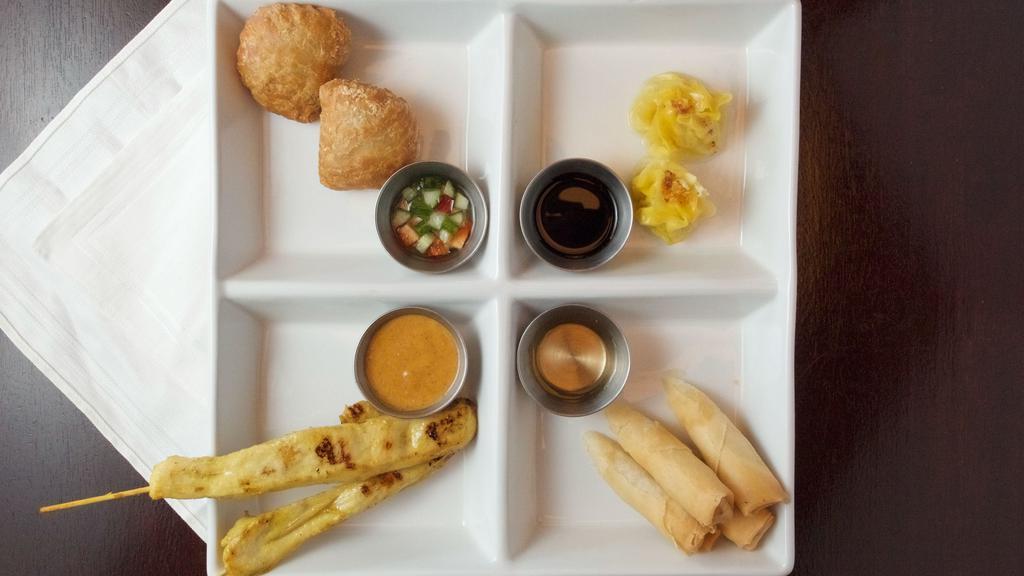 Warwick Sampler (2 Pcs.) · A combination appetizer of chicken satay, spring rolls, curry puff, and dumplings served with an assortment of dipping sauces.