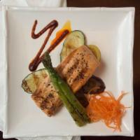 Grilled Salmon · Served with grilled vegetables.
