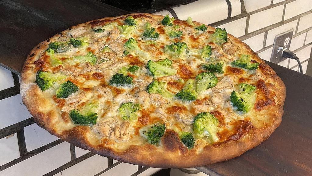 Mozzarella, Roasted Chicken And Broccoli (White Pizza) · Mozzarella Cheese, Oven Roasted Chicken, Broccoli, Grated Pecorino Romano & Olive Oil