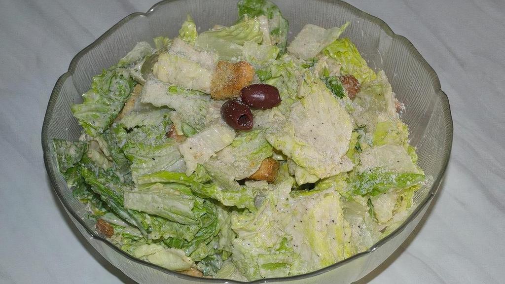 Caesar Salad · Chopped Romaine Hearts • House Croutons • Grated Pecorino Romano Cheese • Served with Savory Caesar Dressing