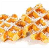 Liege Waffle · Freshly prepared round Liege waffle topped with sugar.