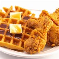 Chicken & Waffles · Crispy tenders paired with Authentic Belgian Liege Waffle. Served with a side of maple syrup.