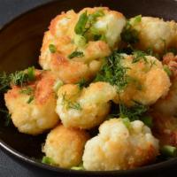 Battered Cauliflower · Fresh cauliflower dipped in batter and fried to perfection.