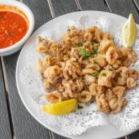 Fried Calamari · Served with a side of Fra Diavolo Sauce.