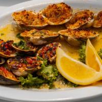 Baked Clams Oreganata · Whole little neck clams baked with seasoned bread crumbs.