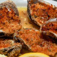 Baked Oysters · Whole oysters baked with seasoned bread crumbs.