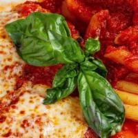 Chicken Parmigiana · Fresh tomato sauce & mozzarella cheese.