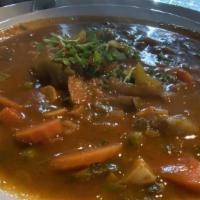 Minestrone Soup · Peppers, zucchini, celery, carrots, garlic, onion, broccoli and mushrooms in a tomato broth ...