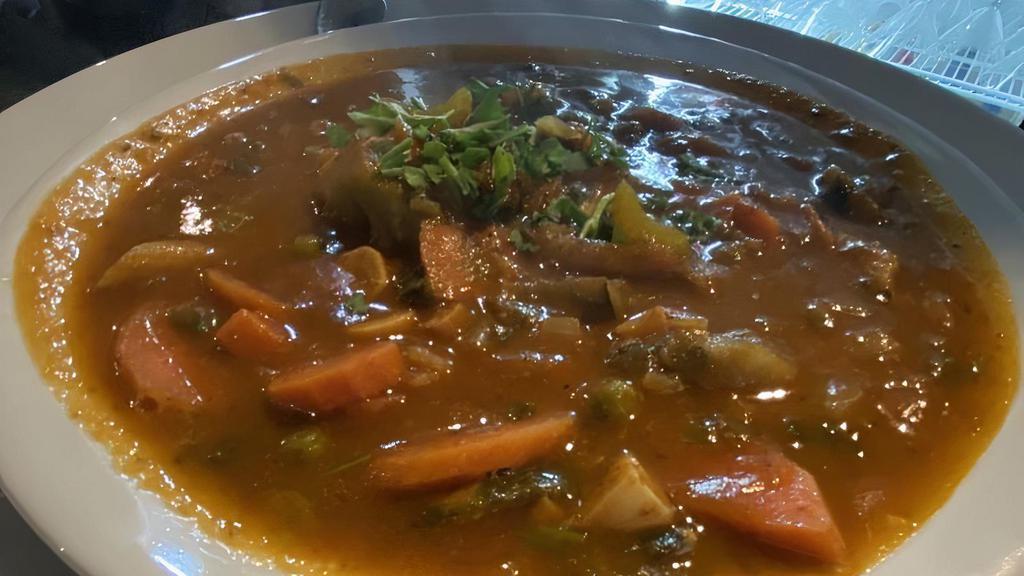Minestrone Soup · Peppers, zucchini, celery, carrots, garlic, onion, broccoli and mushrooms in a tomato broth with noodles.