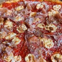 Pizza Con Crudo · Served with prosciutto di Parma.