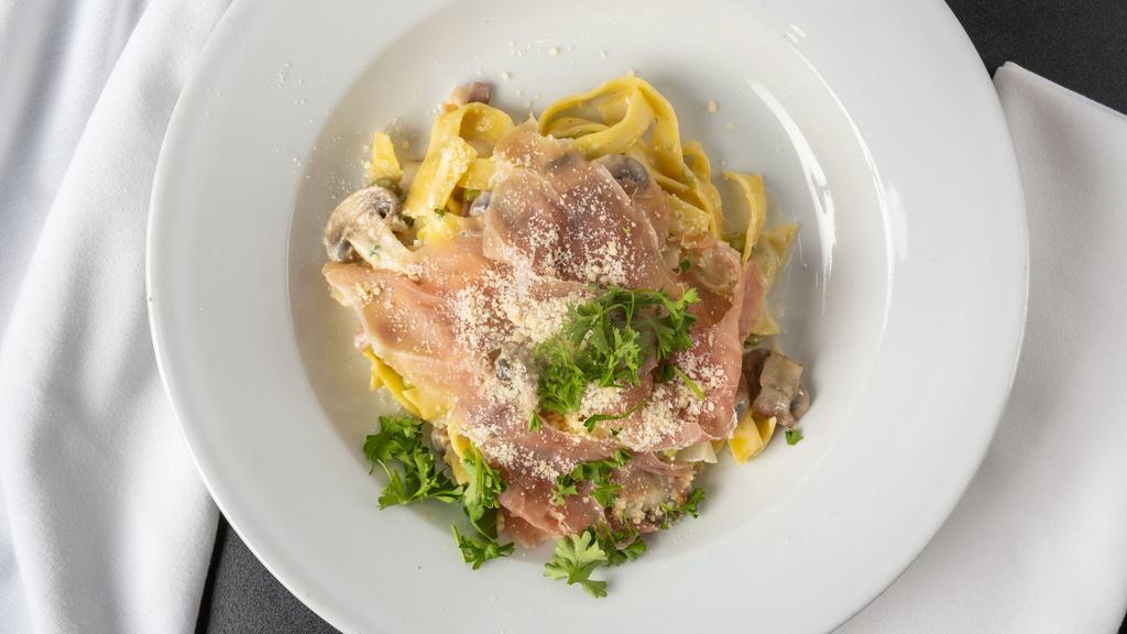 Paglia & Fieno Alla Papalina Pasta · Prosciutto, peas mushroom sauce, egg noodle with spinach.