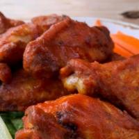 Chicken Wings · With Blue Cheese Dip & Celery Sticks.
