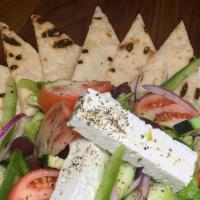 El Greco Salad · With Grilled Pita Cucumber, Scallions, Olives, Sweet Peppers, Feta Cheese, Stuffed Grape Lea...