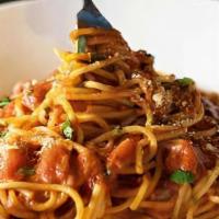 Spaghetti Pomodoro · Fresh Basil, Tomatoes, Extra Virgin Olive Oil.