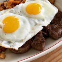 Steak & Eggs · Filet mignon and two eggs with home fries.