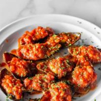 Mussels · Fresh never frozen whole shell mussels cooked to perfection and made to order. Served with b...