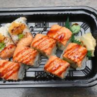 Ninja Roll · Shrimp tempura and avocado inside, topped with spicy crunchy tuna with eel sauce.