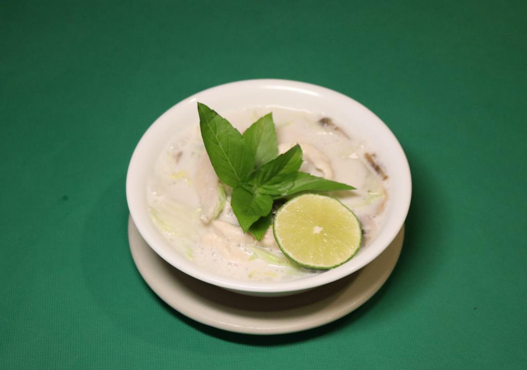 Tom Kha Chicken (Galangal Soup) · A refreshing soup with chicken & coconut milk with lemongrass, mushrooms and galangal.