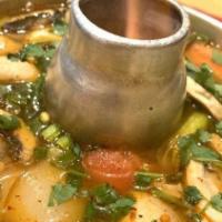 Shrimp Lemongrass Soup · Authentic hot spicy and sour shrimp with Thai herbs.