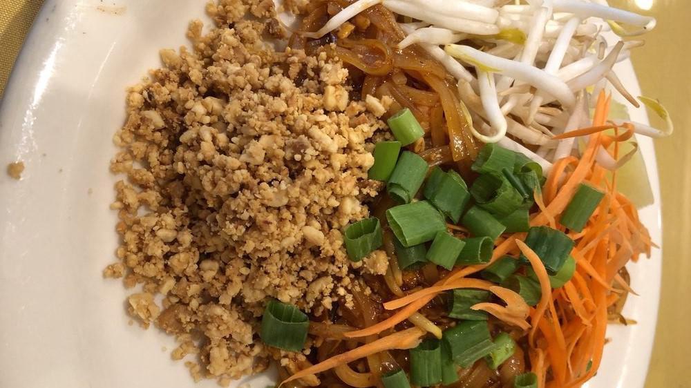 Veggie Pad Thai · The typical Thai noodles, egg, grounded peanuts, bean sprout and scallion.