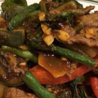 Beef Pad Prik King · Sautéed green beans, carrot in the red curry paste.