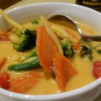 Chicken Red Curry · Bamboo shoots, sweet basil, bamboo shoot, eggplant, carrot simmered in coconut milk.