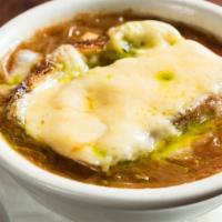 French Onion Soup · With gruyere and Parmesan cheese.