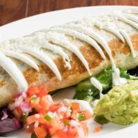 Veggie Burrito · Mexican red rice, pinto beans, mix vegetables, cheese, wrapped in a flour tortilla, and tope...
