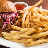 Pulled Pork Sandwich · Pulled pork with barbeque sauce, coleslaw, on brioche bread, with fries.
