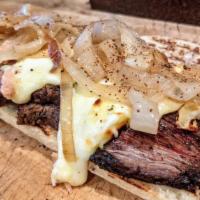 ..Any Day Anytime Sandwich · Roasted steak, sautéed onions, and raclette cheese. Served on a home-baked baguette.