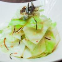 Shio Cabbage  · Fresh cabbage with crispy anchovies, shio tare sauce, sesame oil.