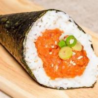 Spicy Tuna Hand Roll · 1 piece. Spicy chopped tuna (raw), sesame, and scallions.